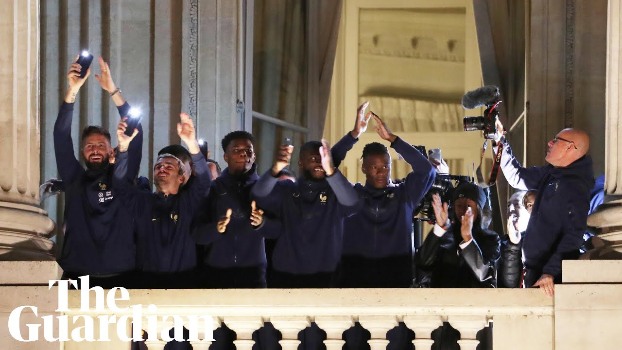 Thousands in Paris cheer arrival of France football team
