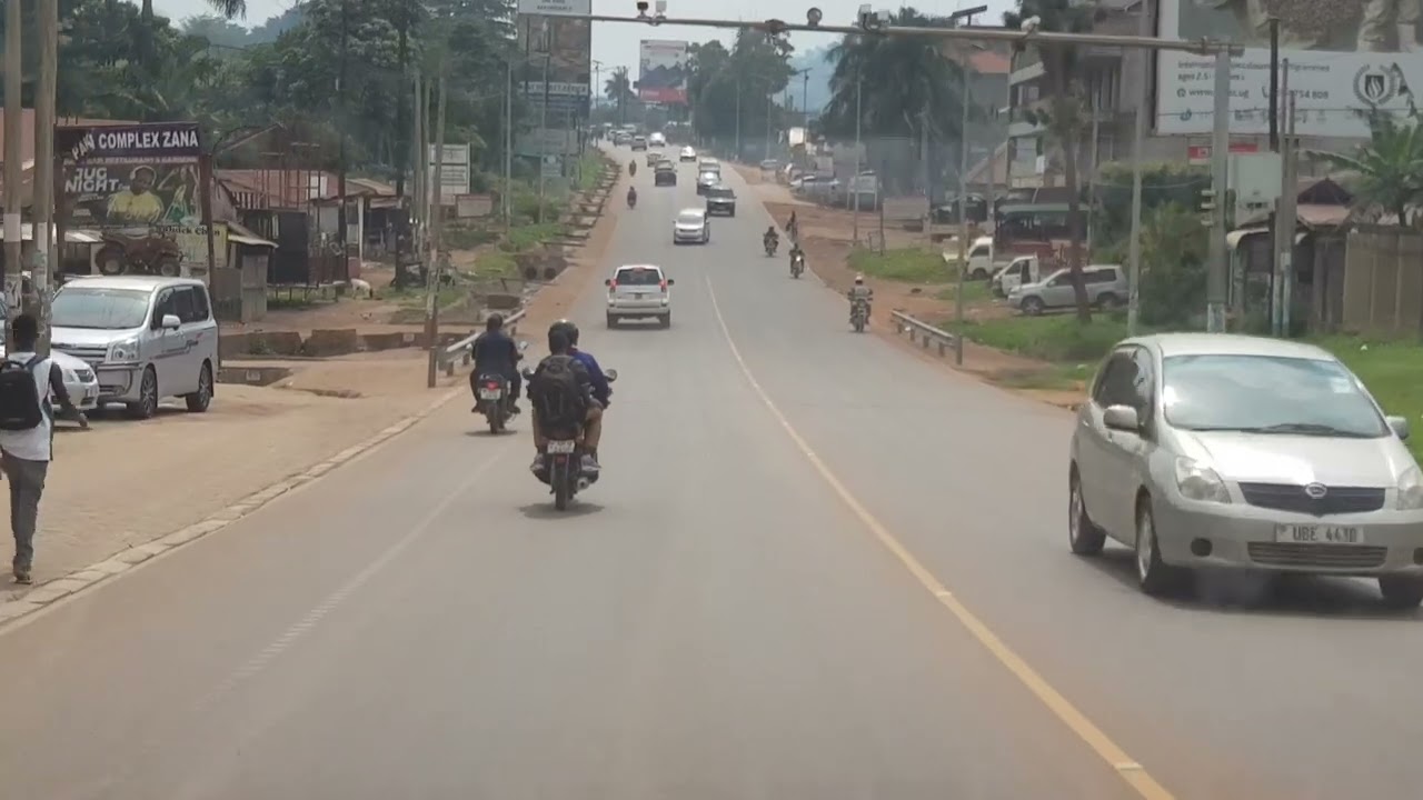 A Swift Drive from Kampala to Entebbe Airport: Uganda's natural Beauty.
