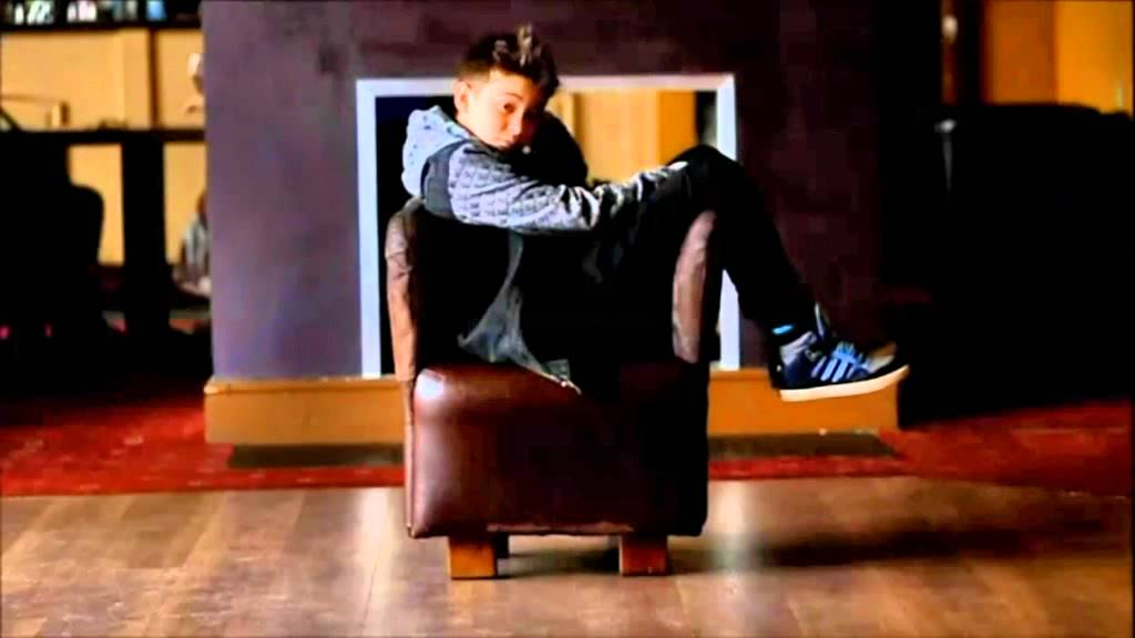 Bars and Melody: Leondre Devries sits on a chair