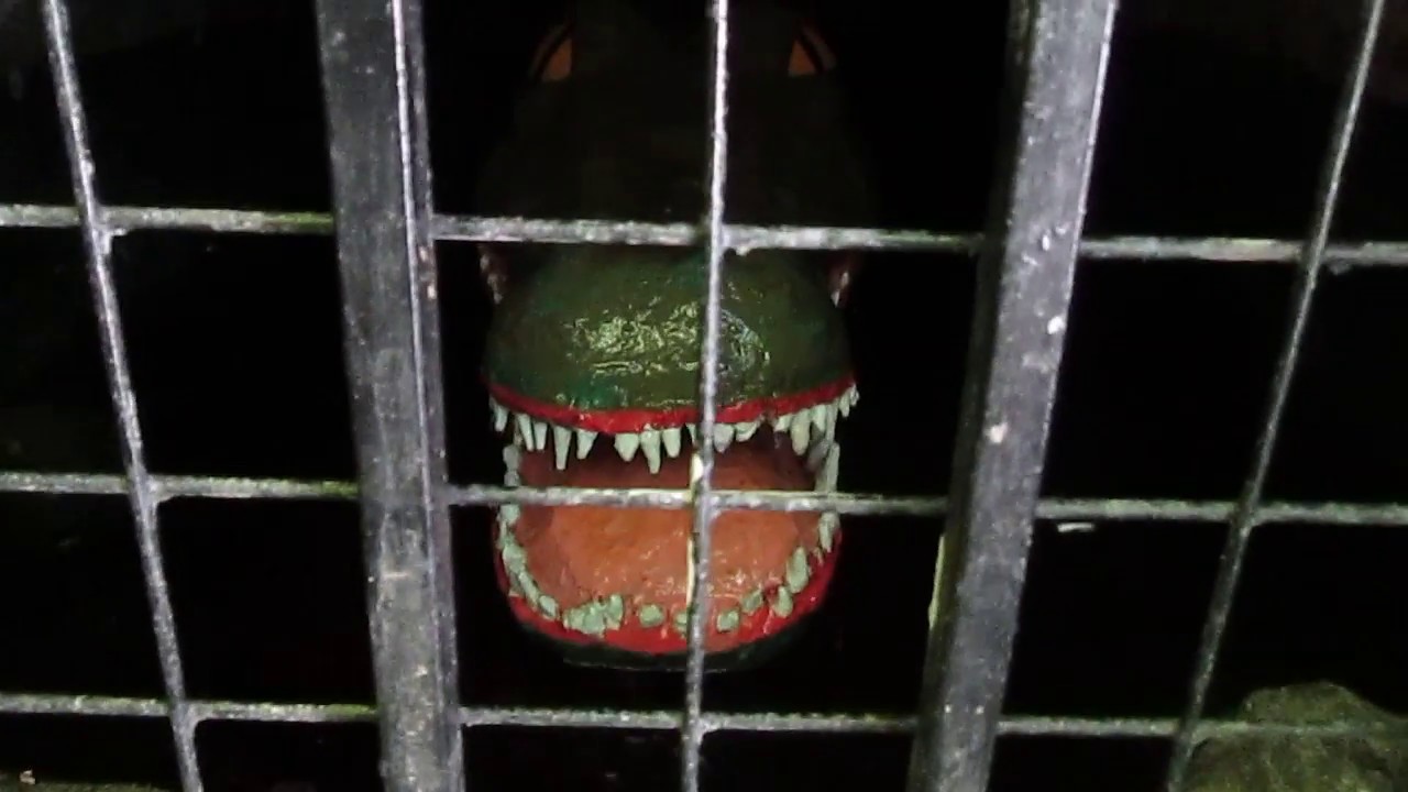 Animatronic crocodile in the woods at Watermouth Castle