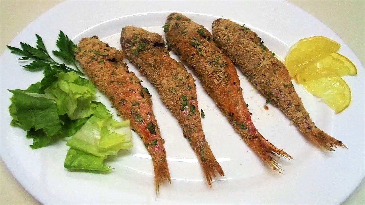 Delicious Baked Fish. Red Mullet fish in the oven Italian Food. Fish recipes.