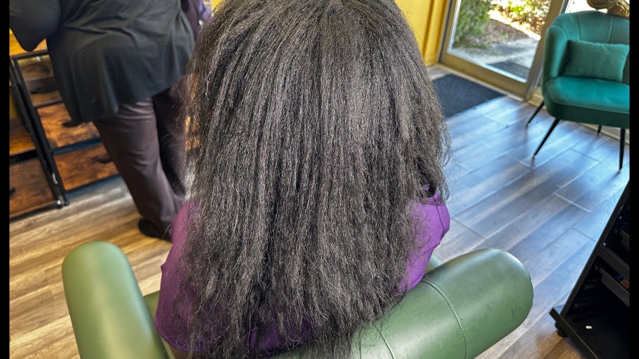 Her hair was relaxed and down her back!!!!
