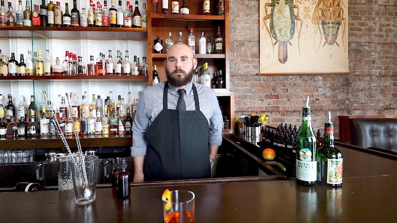 Cure bartender Matt Lofink makes a cocktail