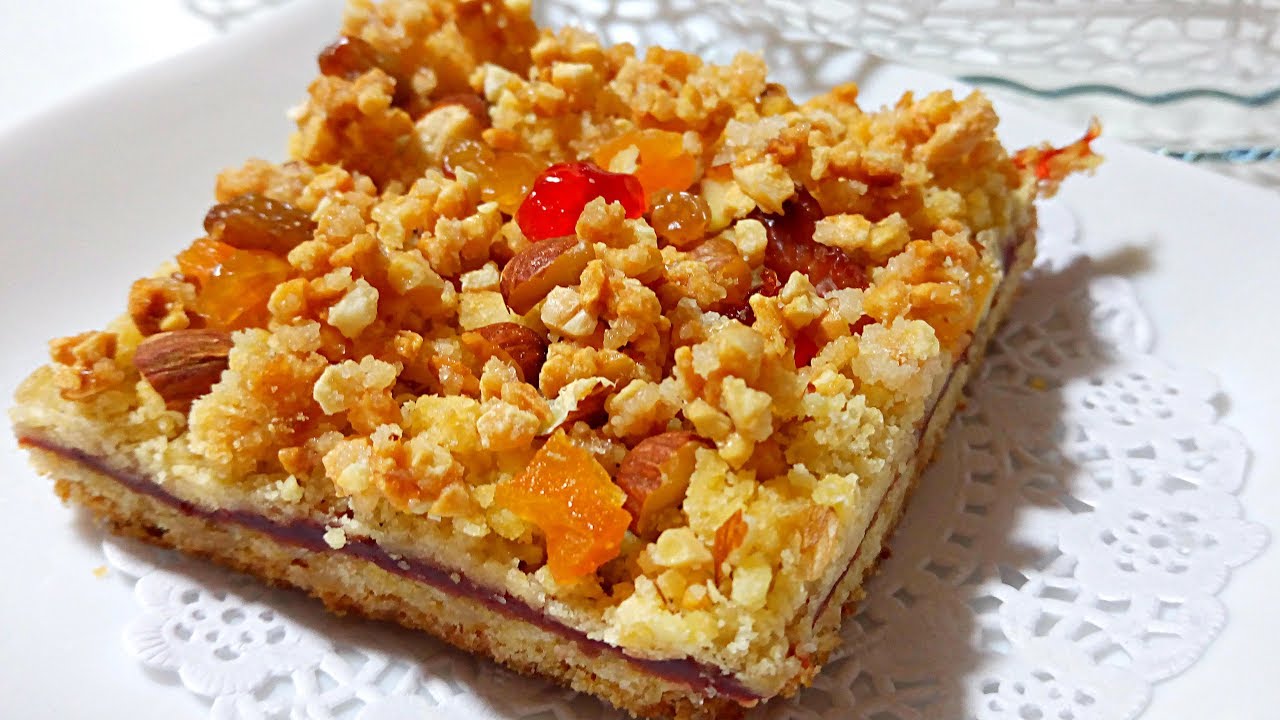 مربعات الكرامبل بالفواكه الجافة وحشوة الفراولة /Carré crumble aux fraises