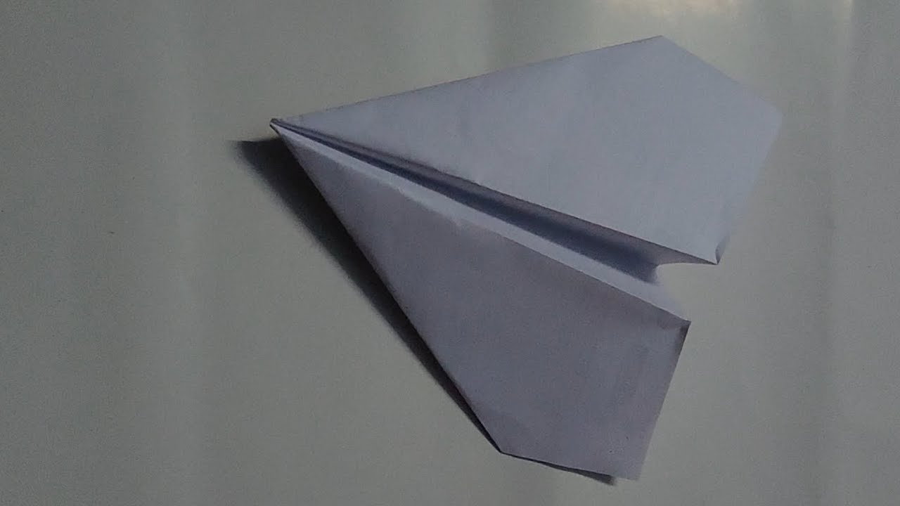 Crafting a paper plane for optimal glide performance. Origami plane. #papercraft #diy #plane. 