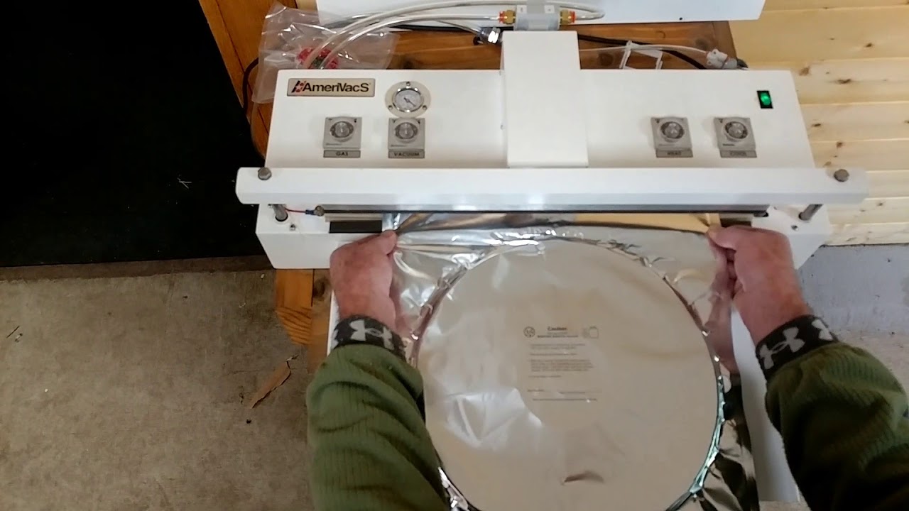Vacuum Sealing with AmerivacS AVN20 Adjusting the vacuum before setting heat seal.