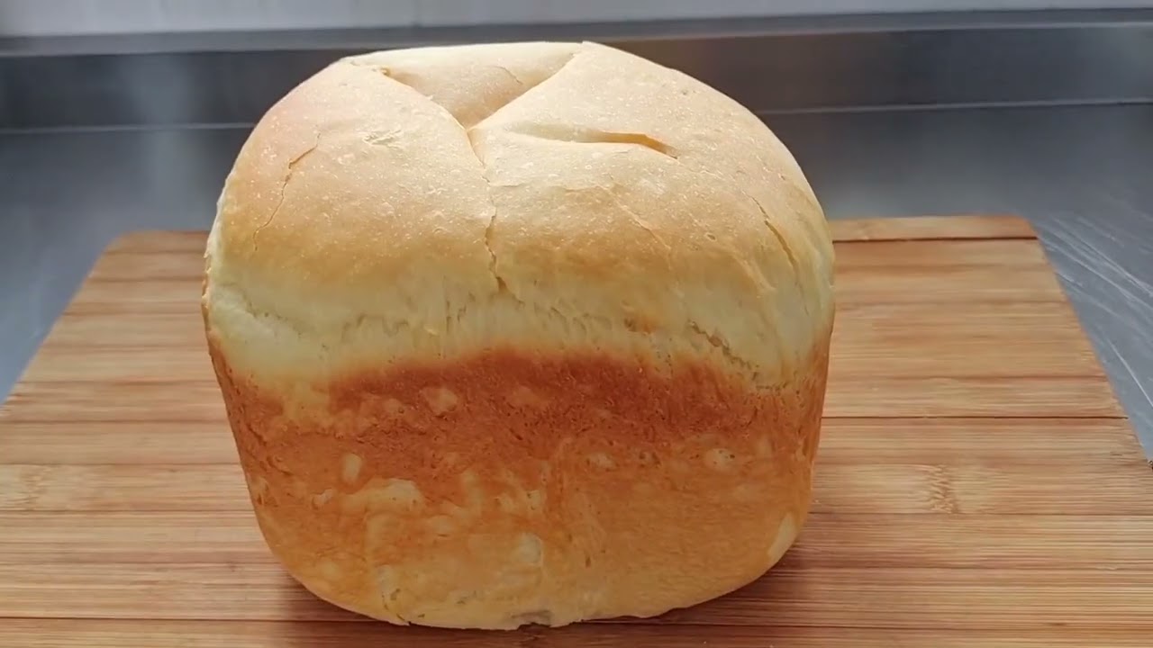 有了面包机早餐真省时，用普通面粉和花生油做的面包，暄软拉丝