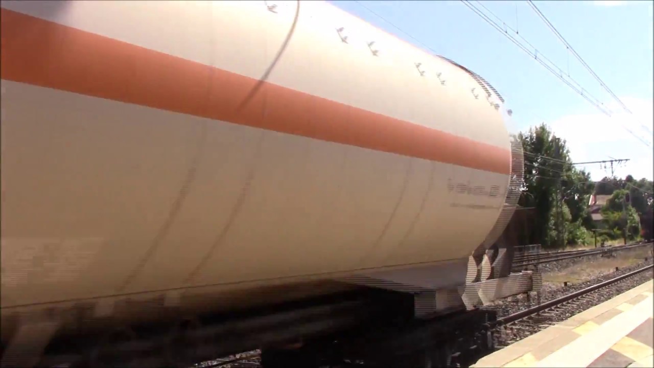 HD Sybic hauled freight train passing through Perouges