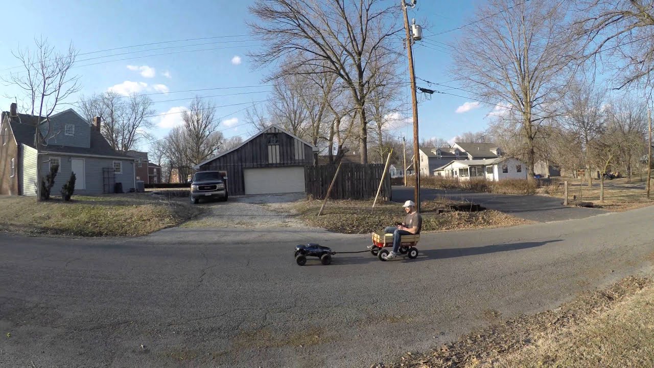 TRAXXAS X-MAXX PULLING ADULT IN A WAGON!