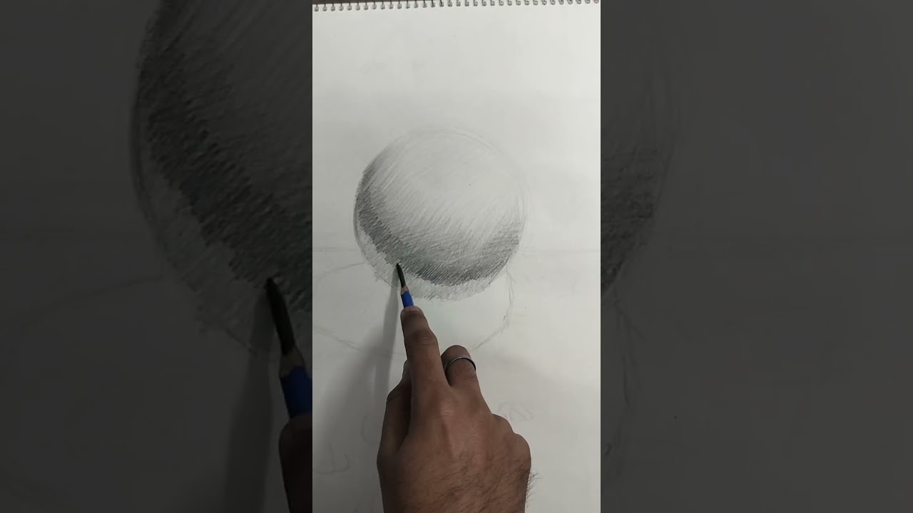 Pencil sketch of sphere with light and shadow