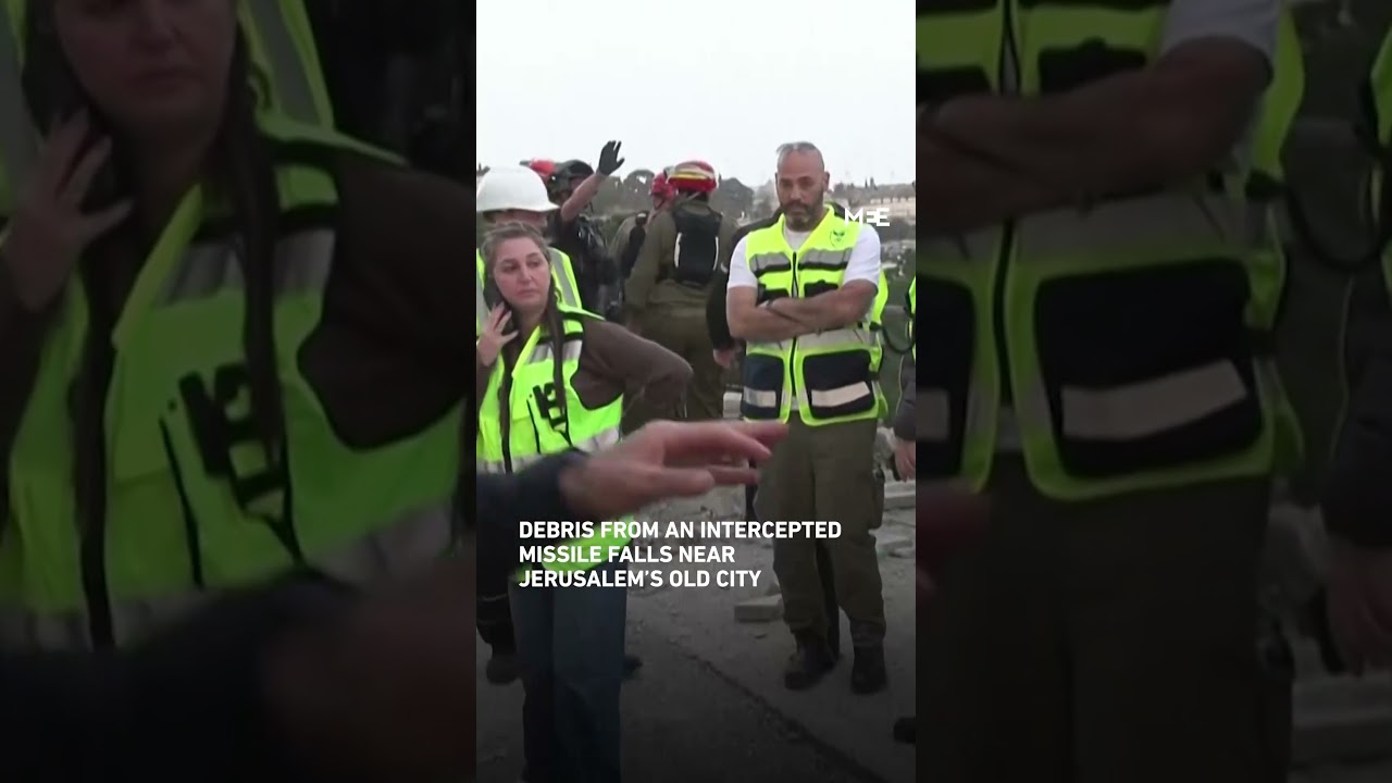 Debris from an intercepted missile falls near Jerusalem’s Old City