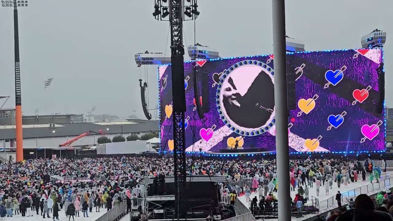 Soaked Ed Sheeran and Christchurch fans jumped and dance in the rain.