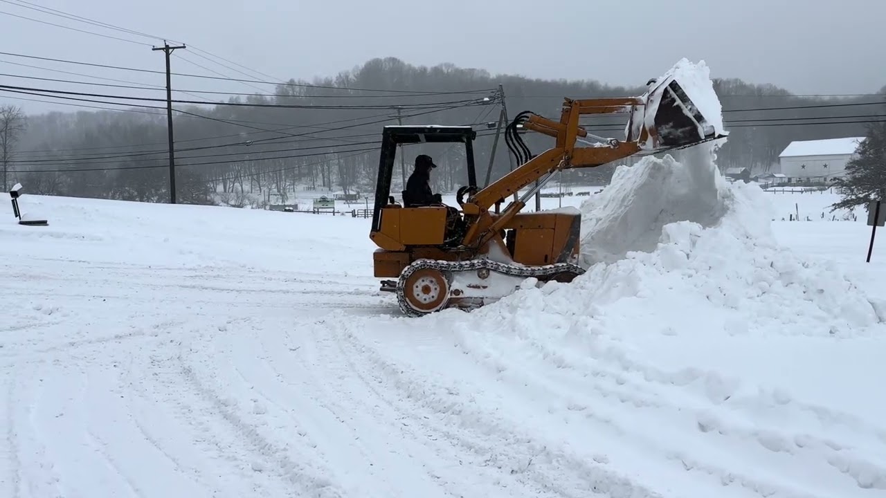 Snowmageddon tackled with a Case 450