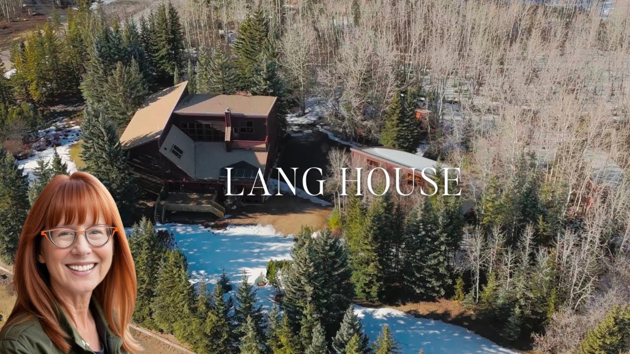 Tour This 9-Level Split Bearspaw Acreage with 2 Basements & 3 Garages!