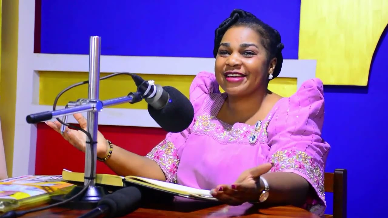 WOMAN MP HOIMA DISTRICT HON HARRIET BUSINGE MUGENYI SPEAKS TO HER VOTERS  WHILE AT LIBERTY FM