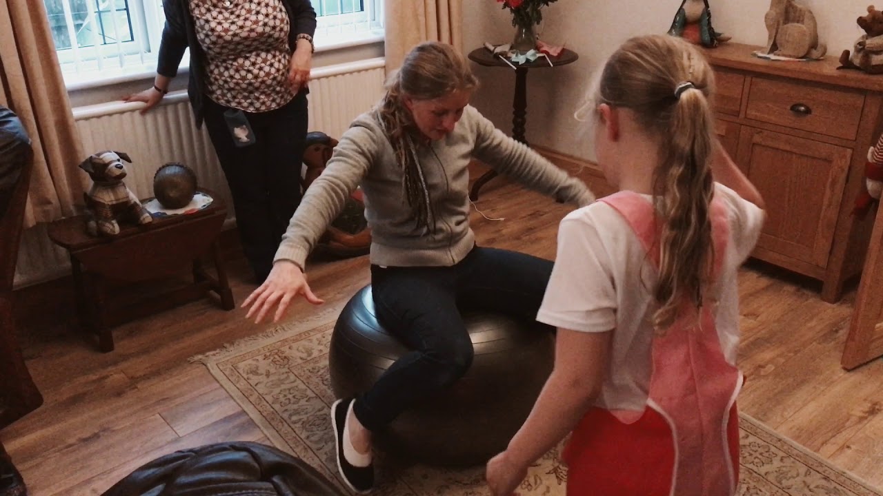 trying to balance on exercise ball.