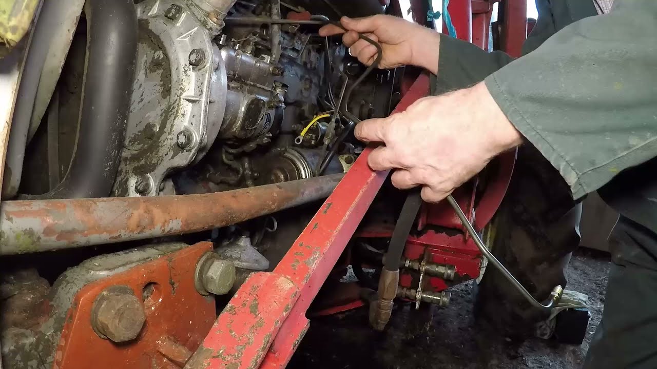 Vintage Thursday. Massey Ferguson 165, fixing a fuel leak.