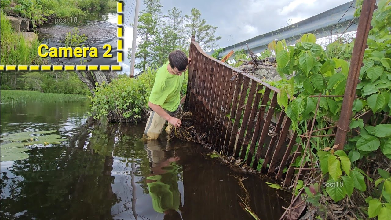 Lifting Up Big Heavy Trash Rack To Drain Over Capacity Pond