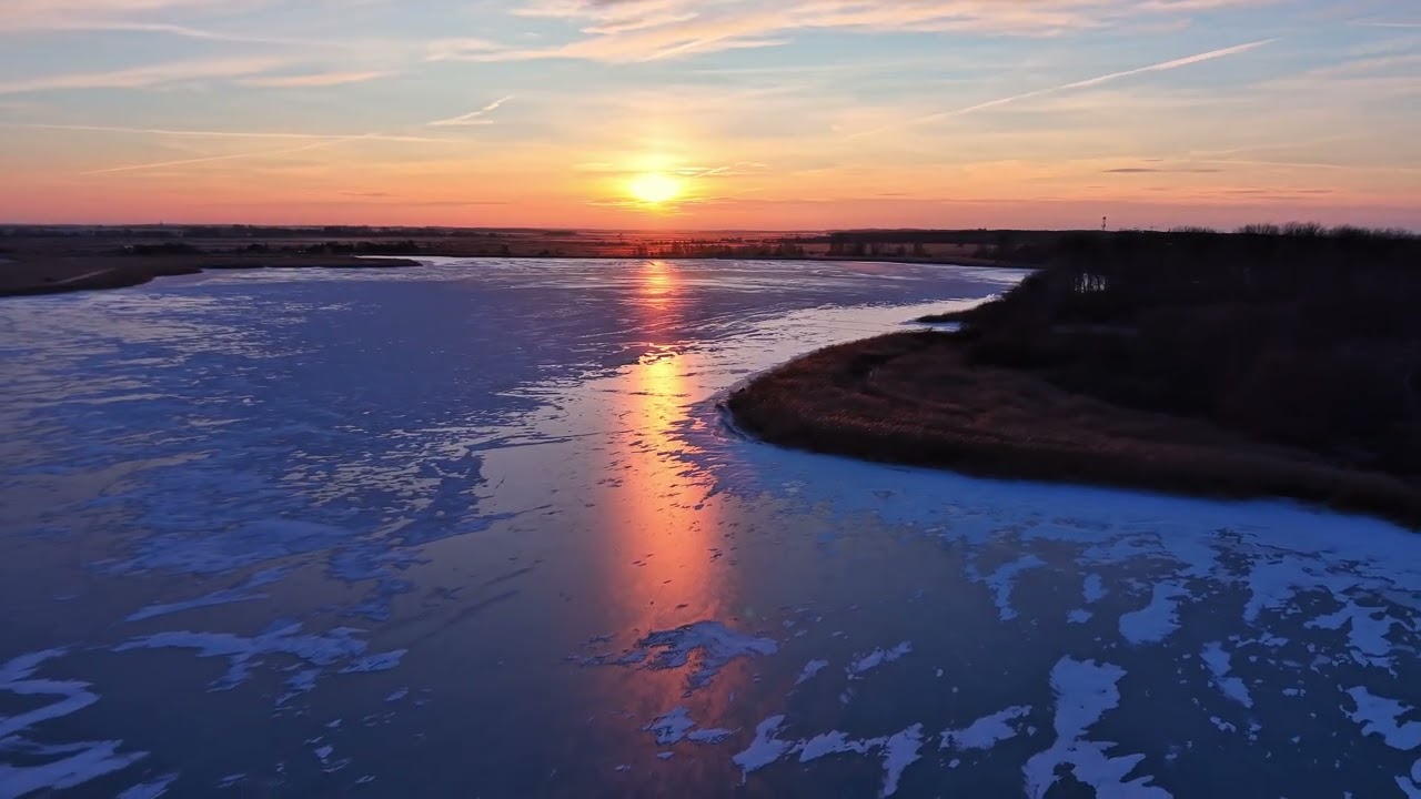 Golden Hour on Ice | Frozen Lake at Sunset