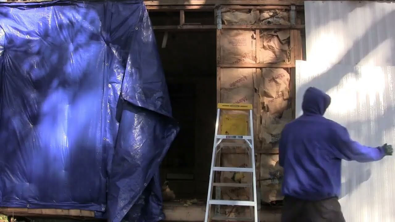 mobile home rehab 15. Siding replacement.