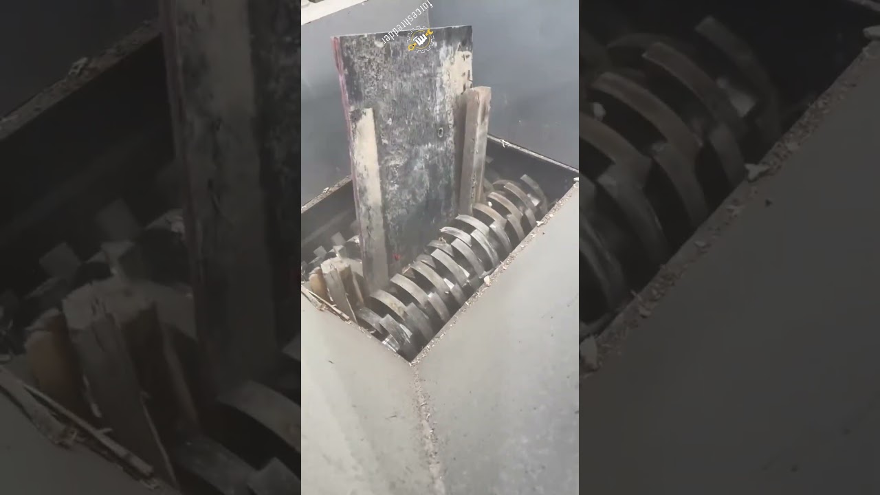 Shredding of Waste Wood Planks for Wood Recycling & Reuse.