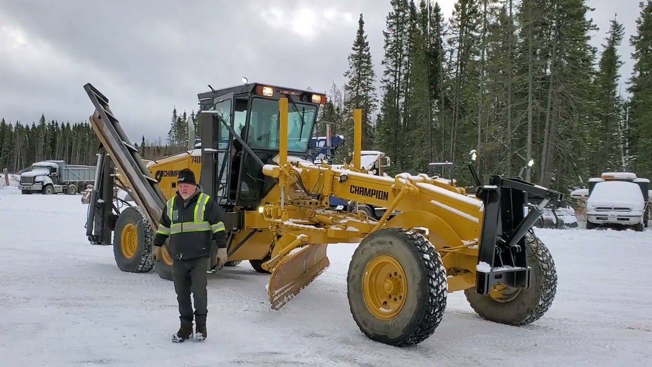 2000 Model 740A Champion Grader with Snow Wing ready for work.