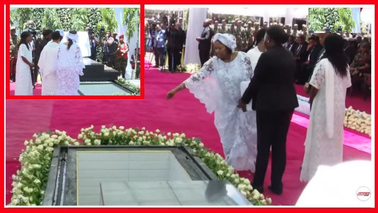 MKE wa LOWASSA na WANAYE WAKIWEKA UDONGO KWENYE KABURI la LOWASSA - HUZUNI KUBWA....