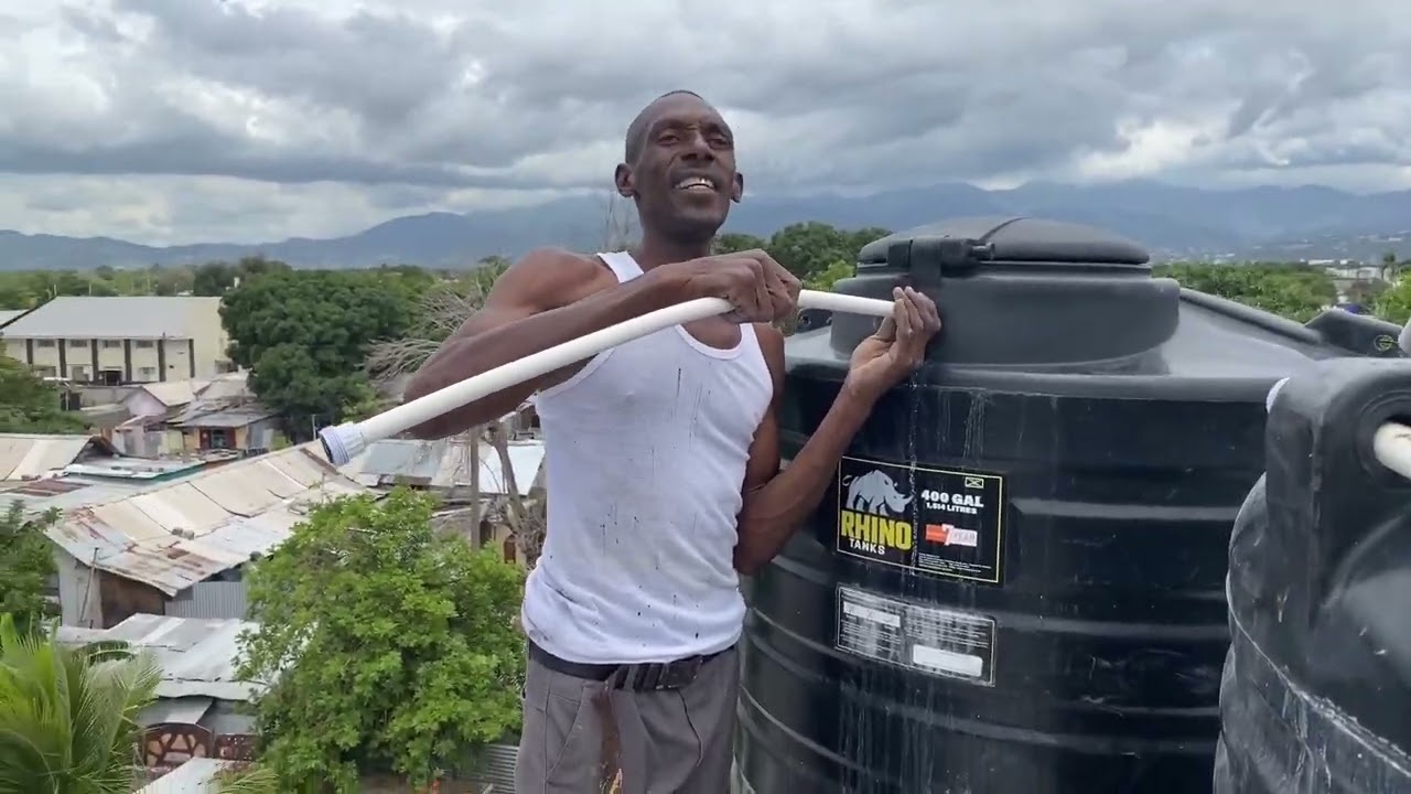 Relocating my water tanks #plumbing  👍🏾roof top setting👍🏾Trench Town ❤️
