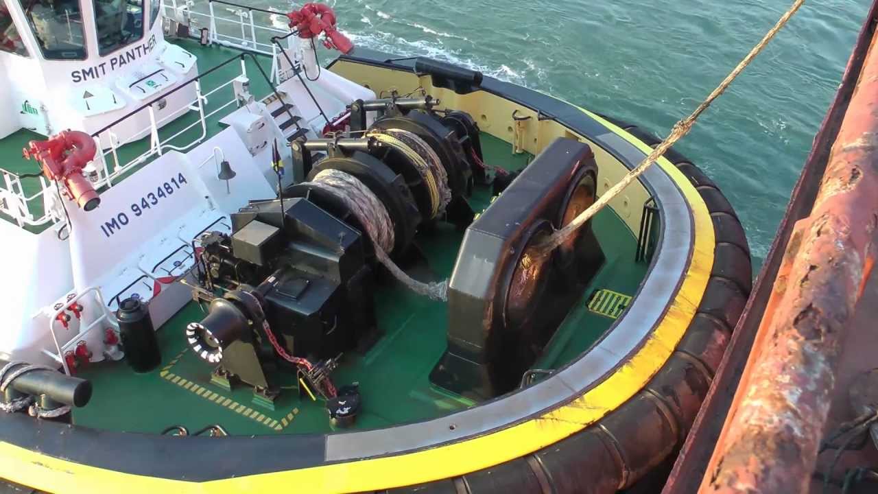 Berge Bureya, SMIT tugboats and KRVE boatmen at the Port of Rotterdam.