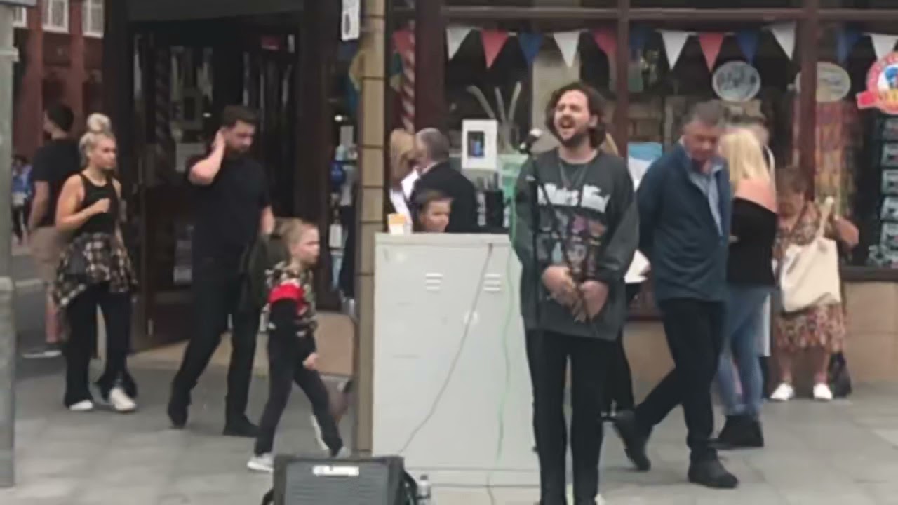 Guy singing in Blackpool town center