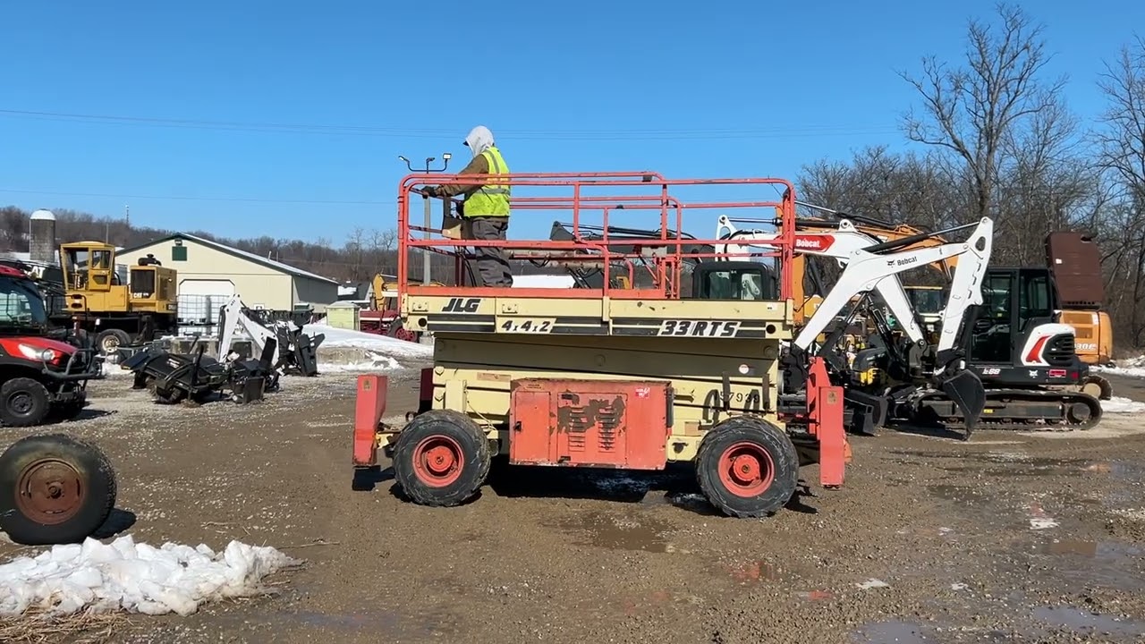 218395 JLG 33-RTS Rough Terrain Scissor Lift MCGREW AUCTION