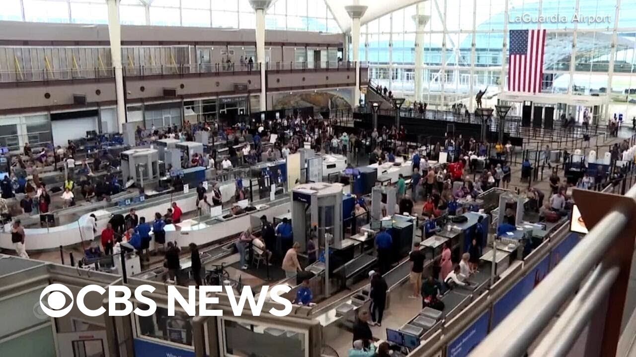 Watch: Long TSA lines, travel delays as partial government shutdown continues
