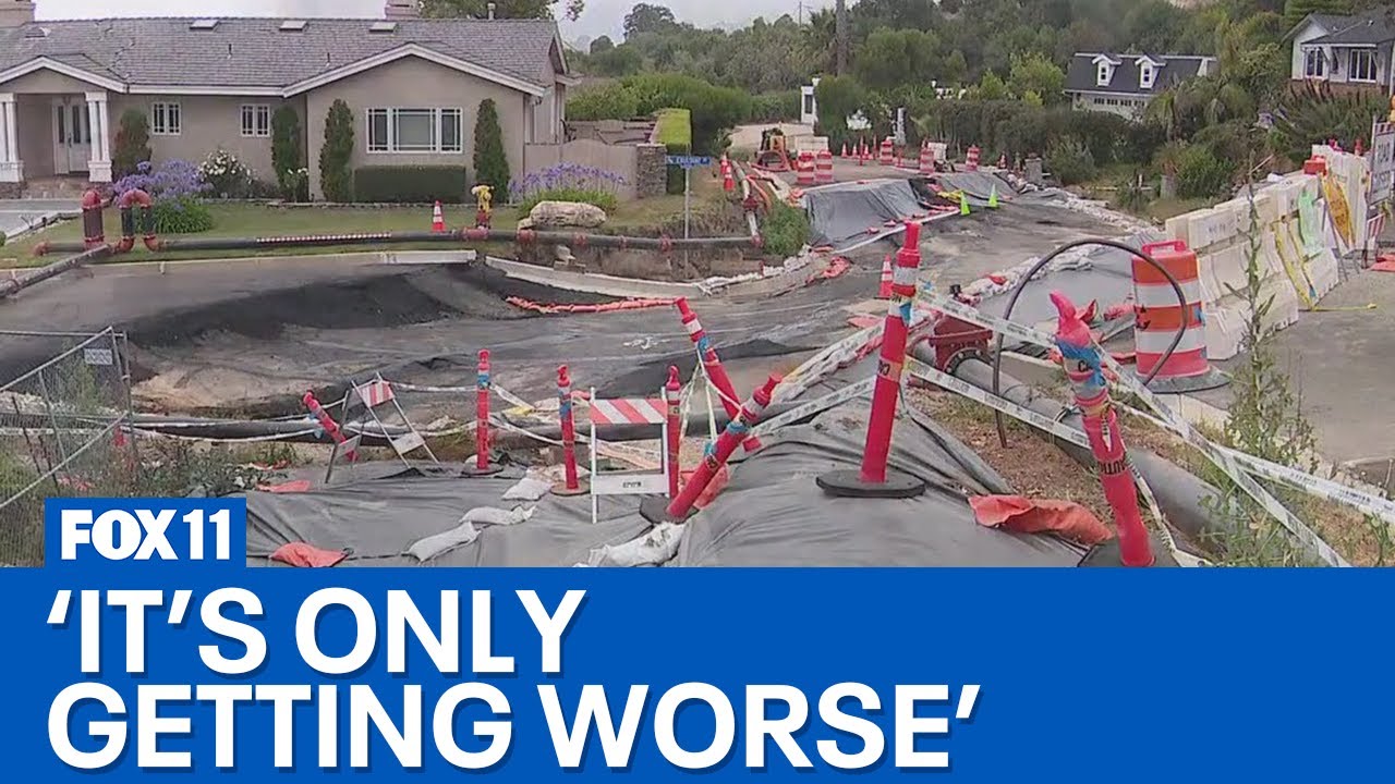 Land movement cracking roads, sinking homes