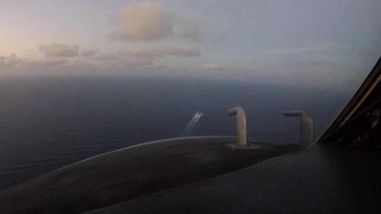 E-2C Hawkeye Twilight Case III Approach to arrested landing aboard USS CARL VINSON