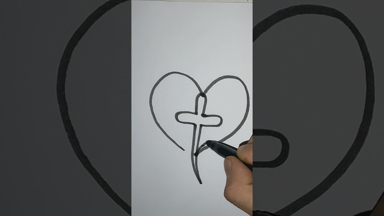 One line art cross inside the heart drawing.☺️