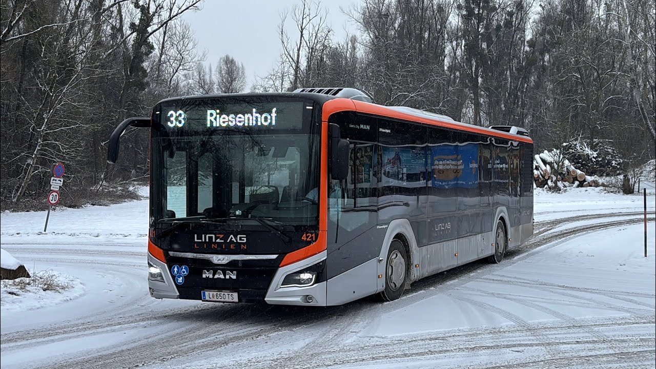 Van Hool Exqui.City 24T & MAN Lion’s City Hybrid bei winterlicher Verhältnissen