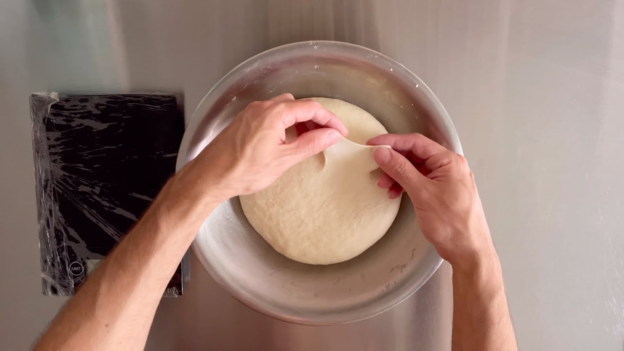 Kneading and shaping pizza dough by Nity