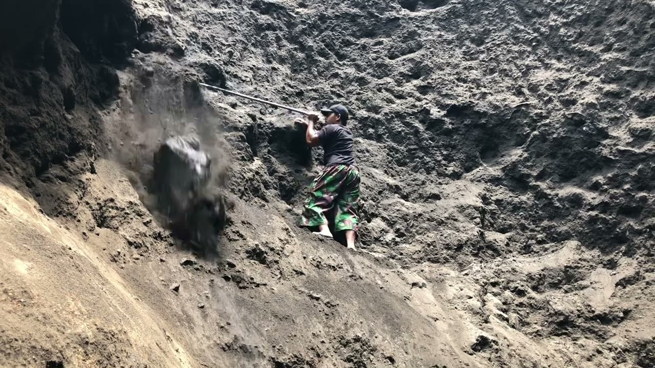 reckless act of dropping massive rock on a cliff