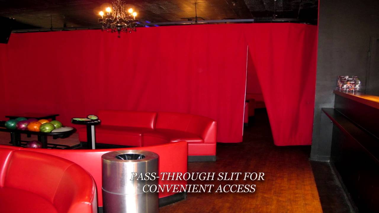 Bowling alley lane dividing theater style curtains and track. AMF Bowlmor, Santa Monica, CA