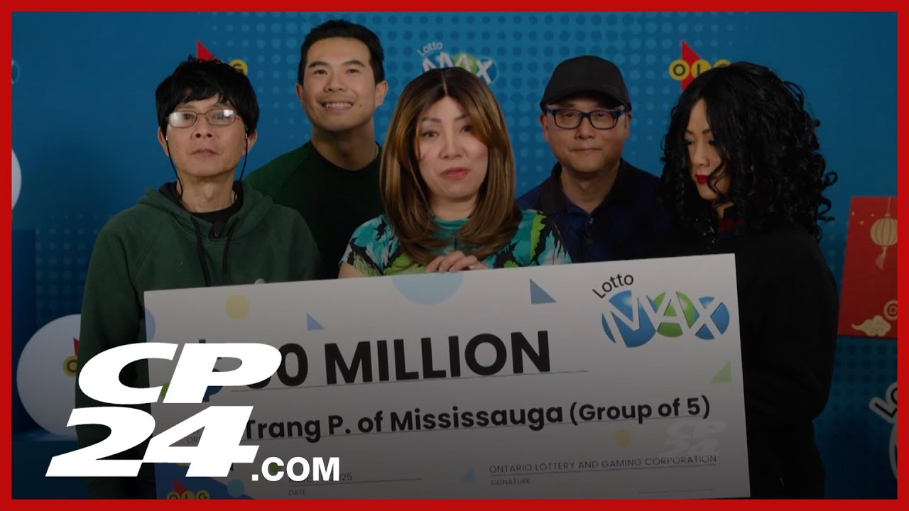 Five co-workers celebrate $60 million Lotto Max jackpot