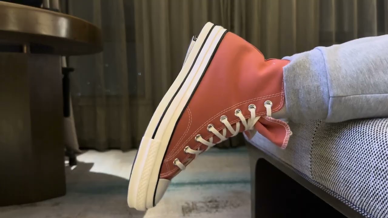 Orange chuck 70 relax on bed