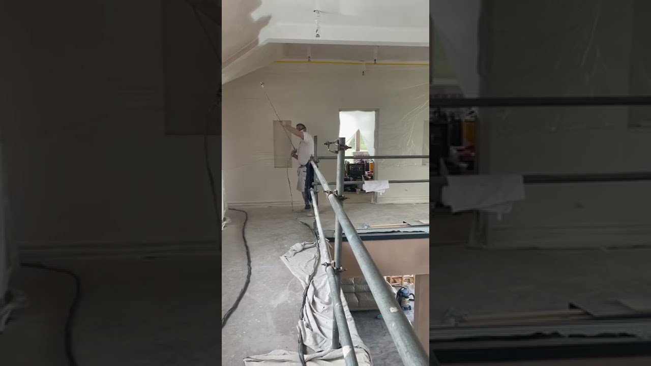 Caparol Nespri Fixx spraying a ceiling.