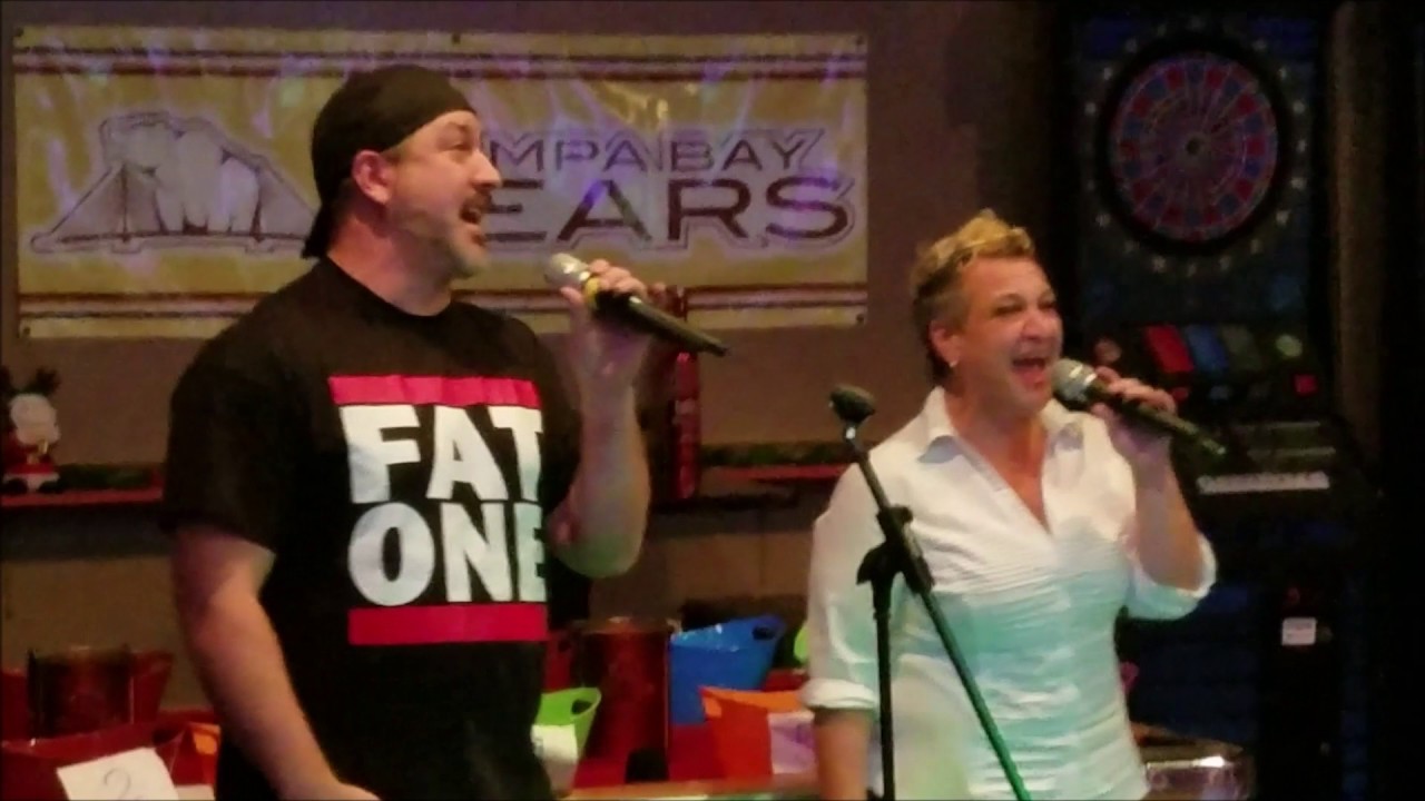 Joey Fatone and Janine Butler singing 