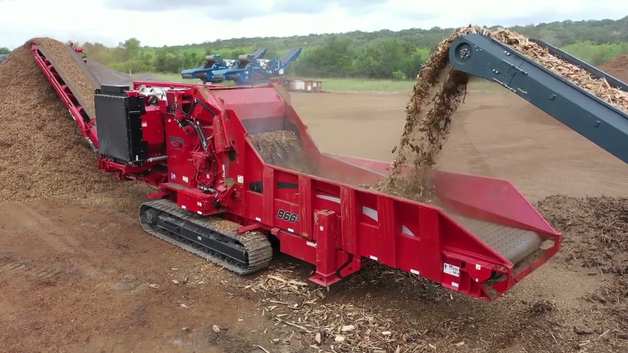 Rotochopper 95DK shredder and B66L grinder Railroad ties