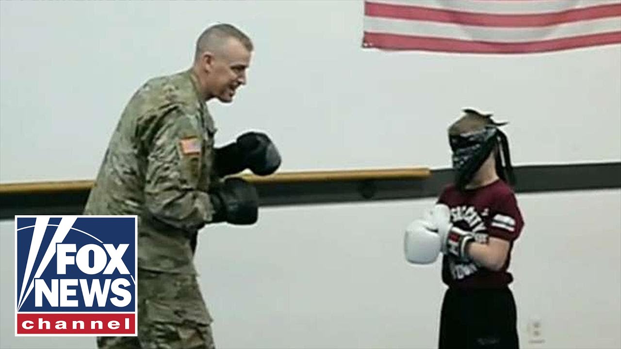 Deployed dad surprises son at Taekwondo practice