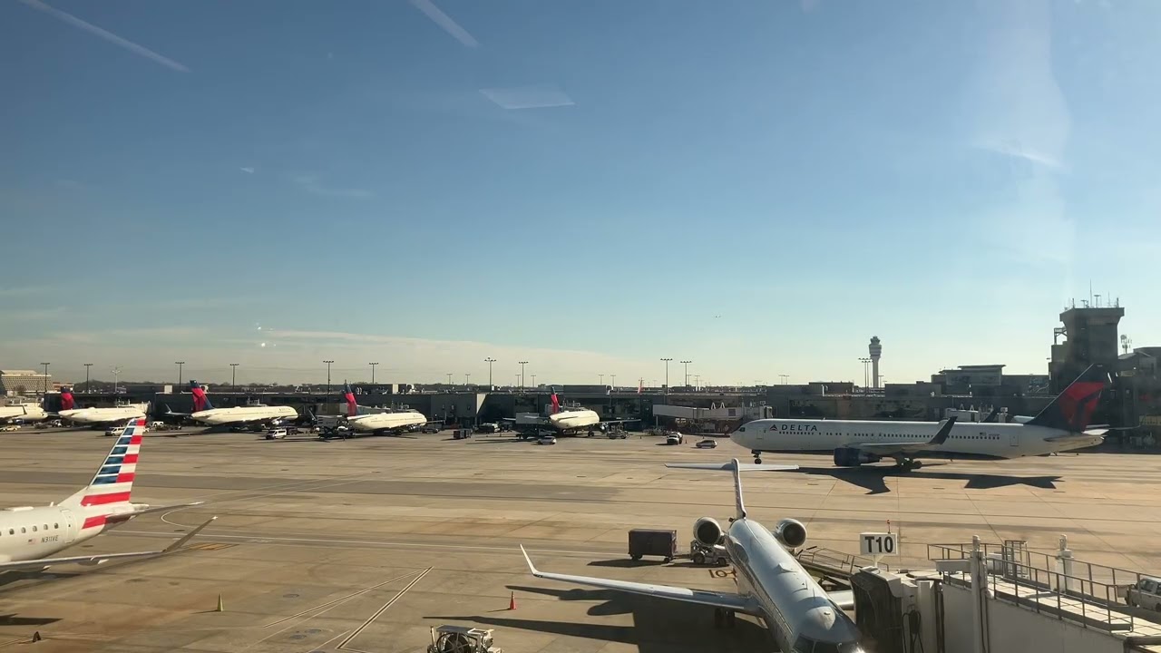 767 pushing back and taxing at Atlanta international airport 