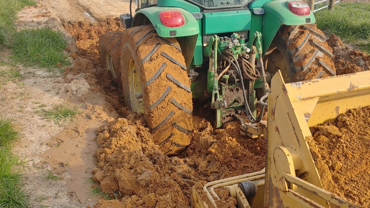 kubota svl95 pushing mud