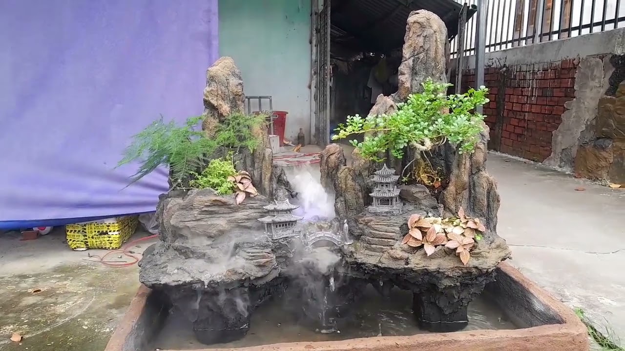 hòn non bộ. tiểu cảnh Tề vân sơn. liên hệ sdt/zalo 0702 956 885.