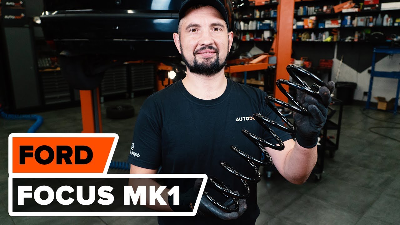 Jak wymienić sprężyny tył w FORD FOCUS (DAW) [PORADNIK AUTODOC]