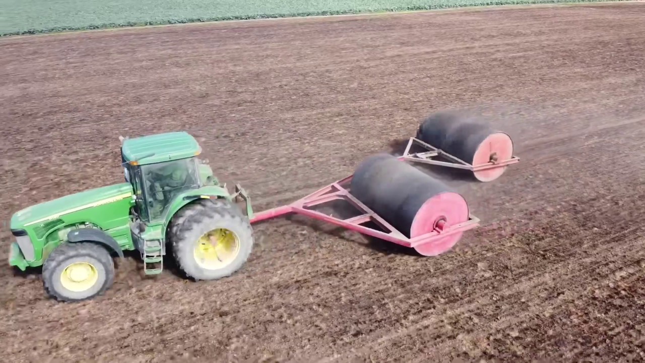 Heavy Rolling with a John Deere and a Plucks Roller
